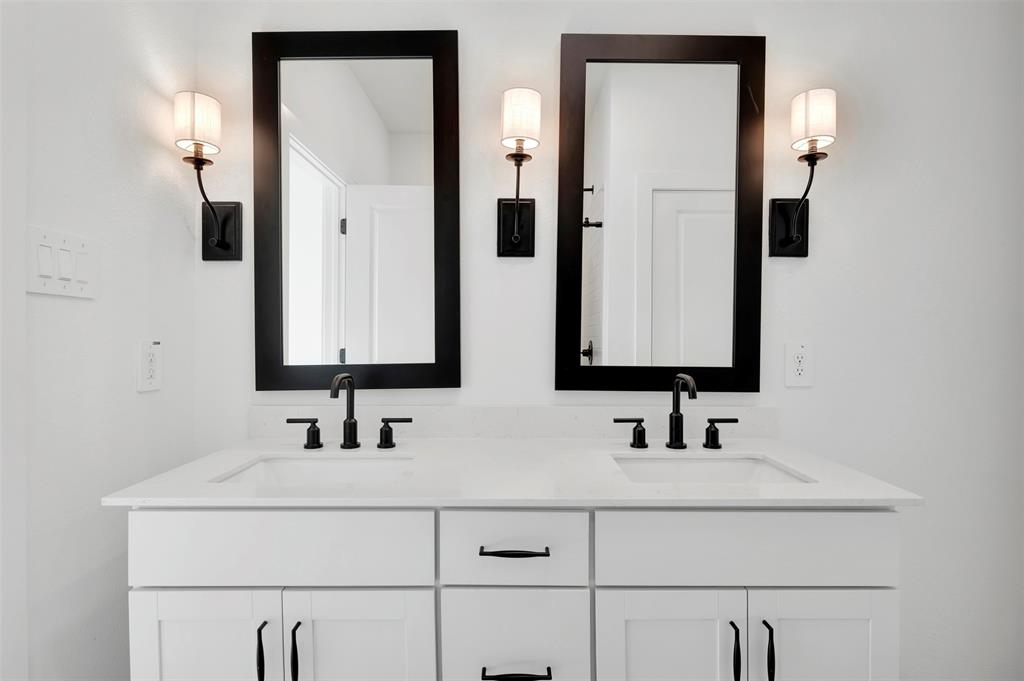 175 Summer Rain Way Newark, TX 76071 - Photo 11 of 39 a bathroom with double vanity sink and two mirror