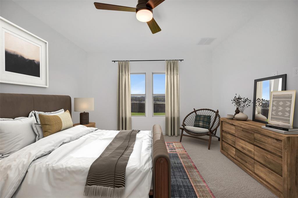 175 Summer Rain Way Newark, TX 76071 - Photo 15 of 39 a bedroom with a large bed couch and a window