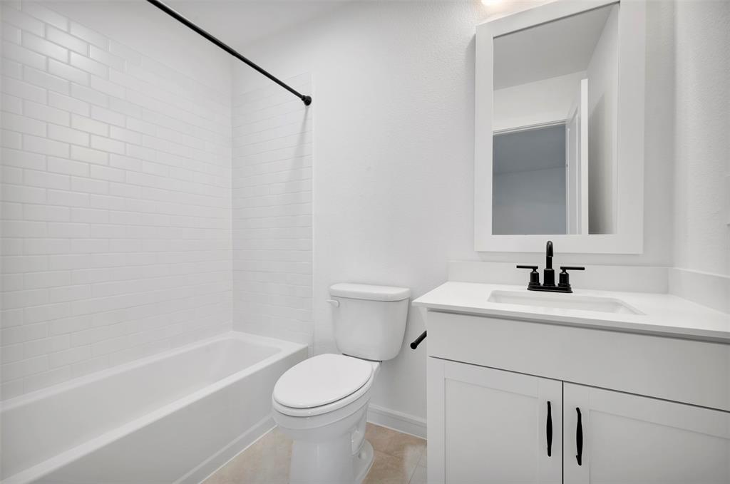 175 Summer Rain Way Newark, TX 76071 - Photo 21 of 39 a bathroom with a sink a toilet and shower