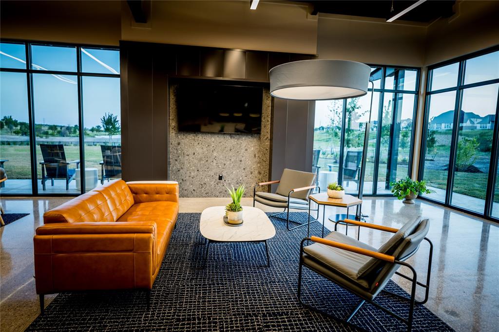 175 Summer Rain Way Newark, TX 76071 - Photo 30 of 39 a balcony with furniture and a potted plant