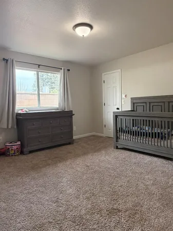 a view of a room with balcony and stairs