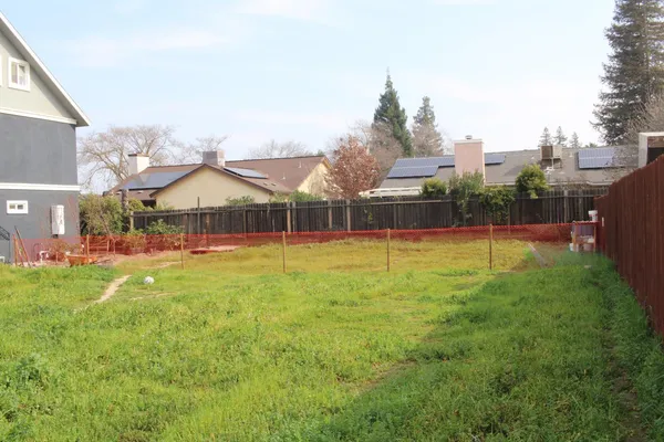 a view of a house with a swimming pool