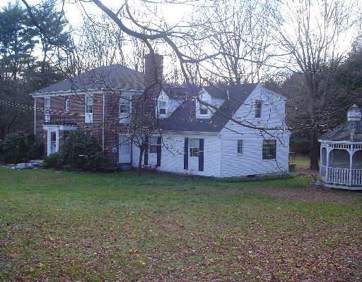 555 Round Hill Road Fairfield, CT 06824 - Photo 1 of 1 a house view with a garden space