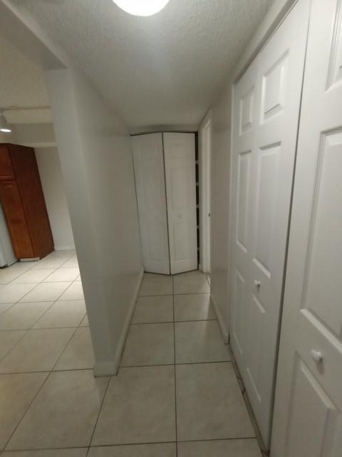 941 Lyons Road, Unit 5105 Coconut Creek, FL 33063 - Photo 11 of 22 a view of entryway with window