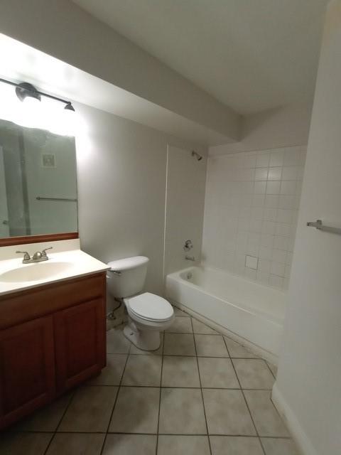 941 Lyons Road, Unit 5105 Coconut Creek, FL 33063 - Photo 12 of 22 a bathroom with a sink a toilet and bathtub