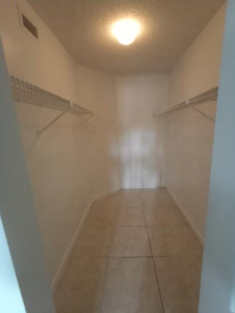 941 Lyons Road, Unit 5105 Coconut Creek, FL 33063 - Photo 15 of 22 a view of an empty room