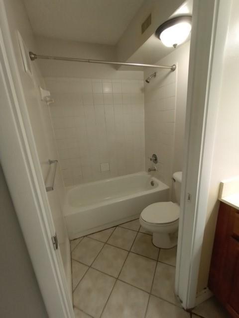 941 Lyons Road, Unit 5105 Coconut Creek, FL 33063 - Photo 9 of 22 a bathroom with a granite countertop bathtub shower and toilet