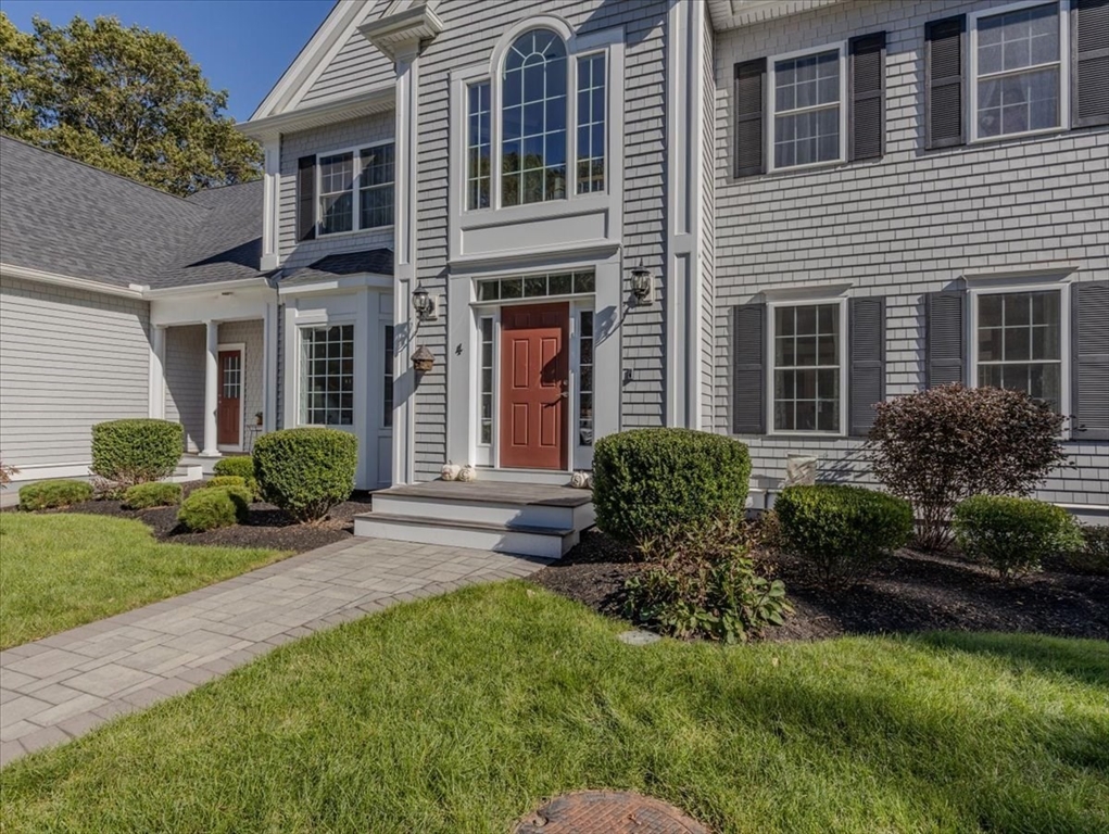 4 Lost Brook Trail Walpole, MA 02081 - Photo 2 of 42 a house view with a garden space