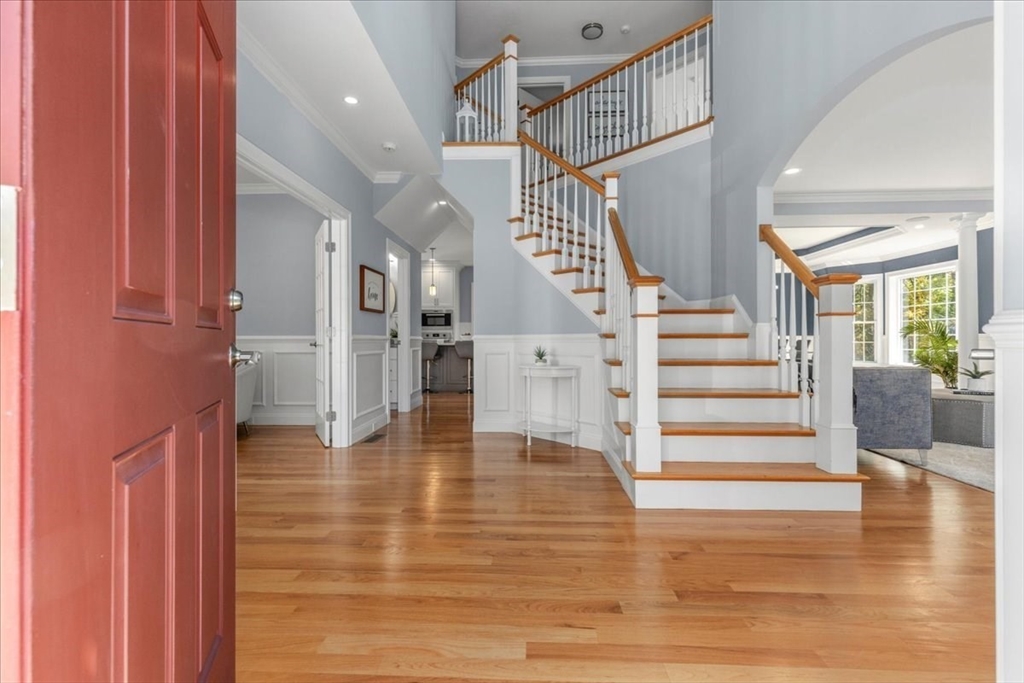 4 Lost Brook Trail Walpole, MA 02081 - Photo 4 of 42 a view of entryway and hall with wooden floor