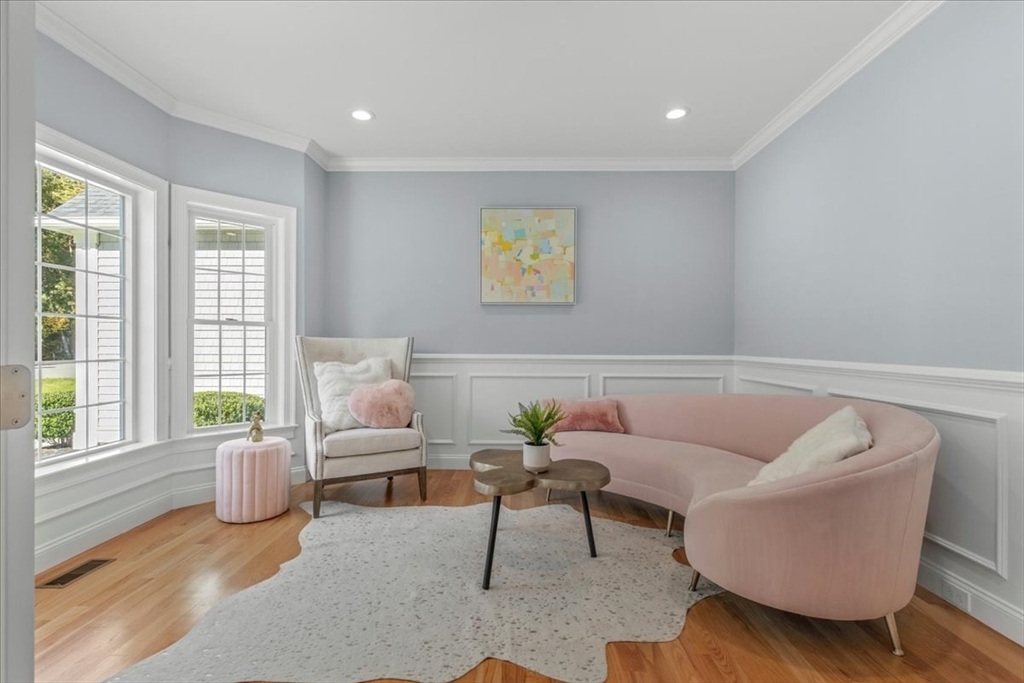 4 Lost Brook Trail Walpole, MA 02081 - Photo 5 of 42 a living room with furniture and a potted plant