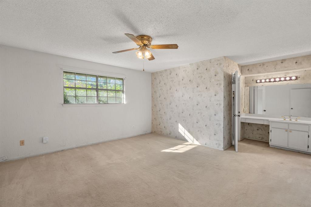 337 Town N Drive Terrell, TX 75160 - Photo 17 of 30 a view of an empty room with a window