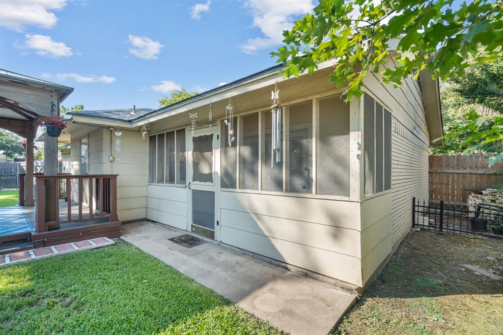 337 Town N Drive Terrell, TX 75160 - Photo 23 of 30 a view of house with backyard and outdoor seating