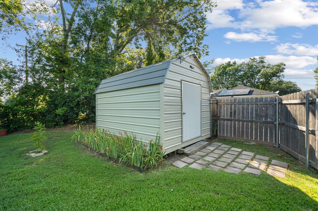 337 Town N Drive Terrell, TX 75160 - Photo 28 of 30 a view of a backyard with a garden