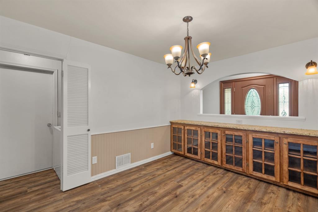 337 Town N Drive Terrell, TX 75160 - Photo 8 of 30 a view of a livingroom with wooden floor