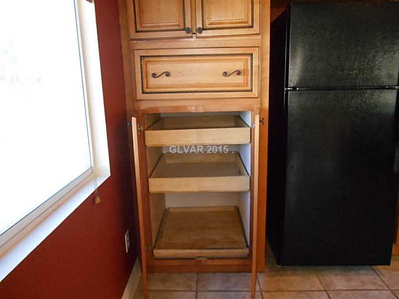 260 Camelback Ridge Avenue Henderson, NV 89012 - Photo 6 of 28 Kitchen. Pantry with pull out drawyers