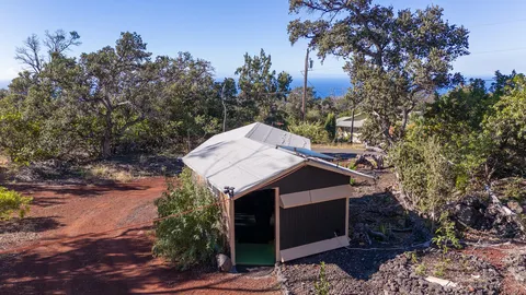 a room with furniture and a large window