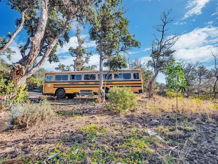 a living room with lots of furniture and window