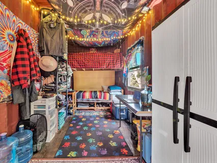 a view of a backyard with sitting area