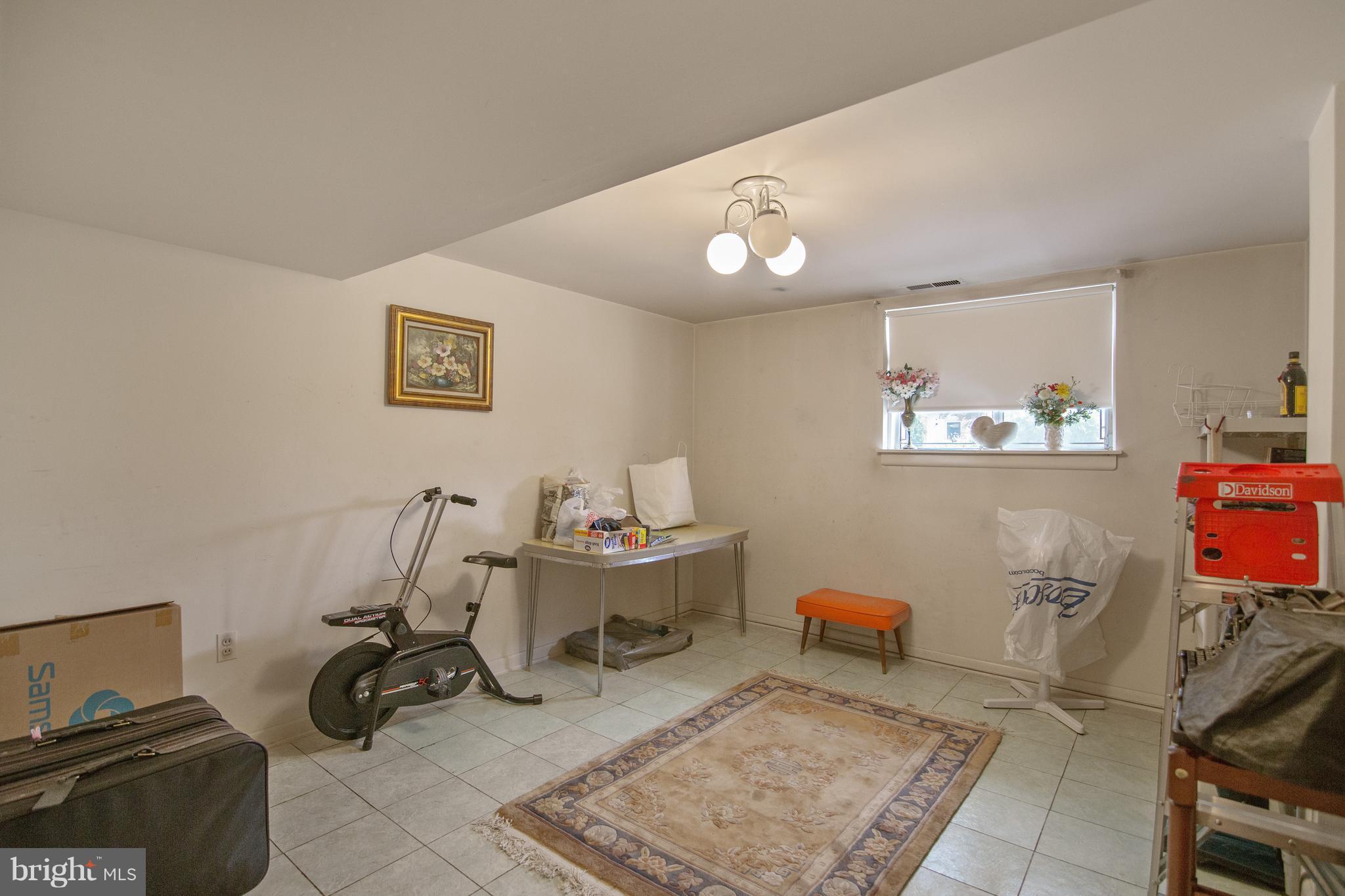 7504 Shelowood Road Baltimore, MD 21208 - Photo 25 of 29 a view of a workspace with furniture