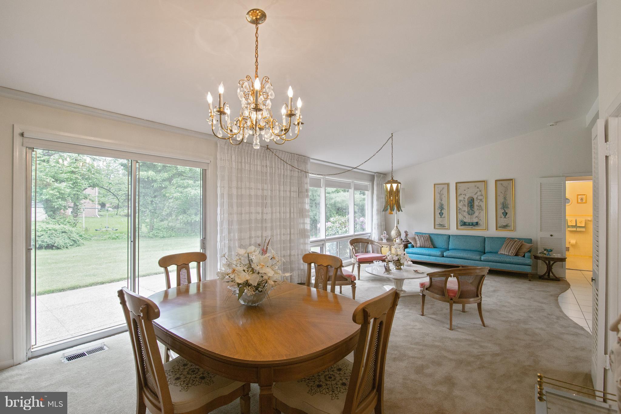 7504 Shelowood Road Baltimore, MD 21208 - Photo 7 of 29 a view of a dining room with furniture window and outside view