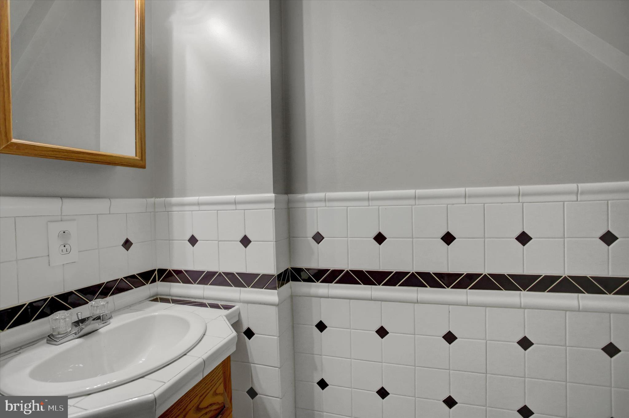 615 Walnut Bottom Road Shippensburg, PA 17257 - Photo 11 of 47 a bathroom with a sink and a mirror