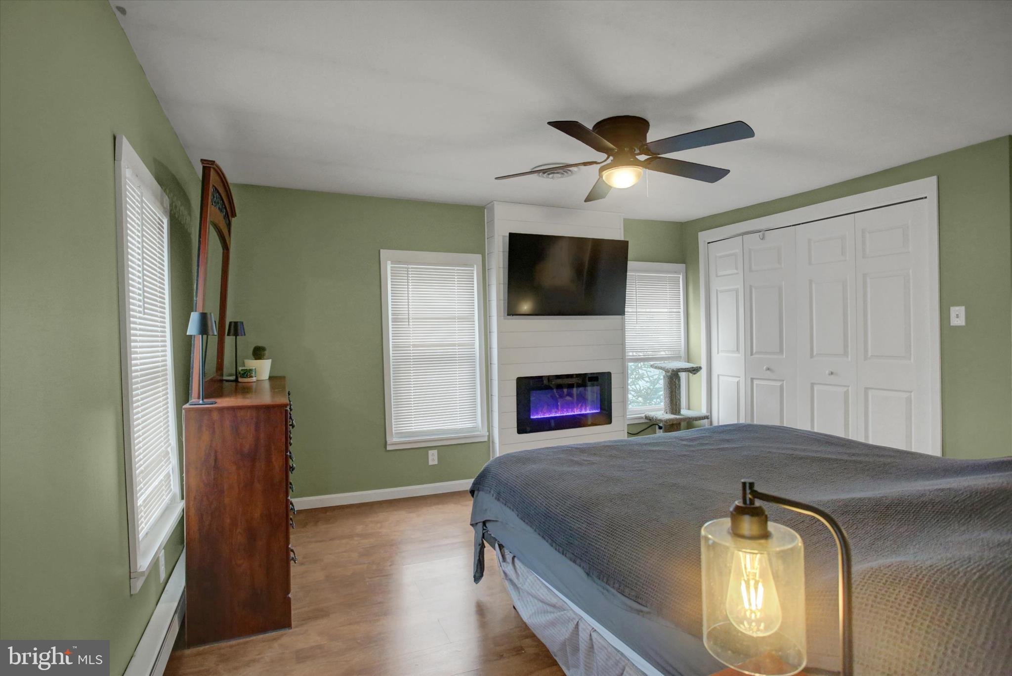 615 Walnut Bottom Road Shippensburg, PA 17257 - Photo 27 of 47 a bedroom with a bed and a fireplace