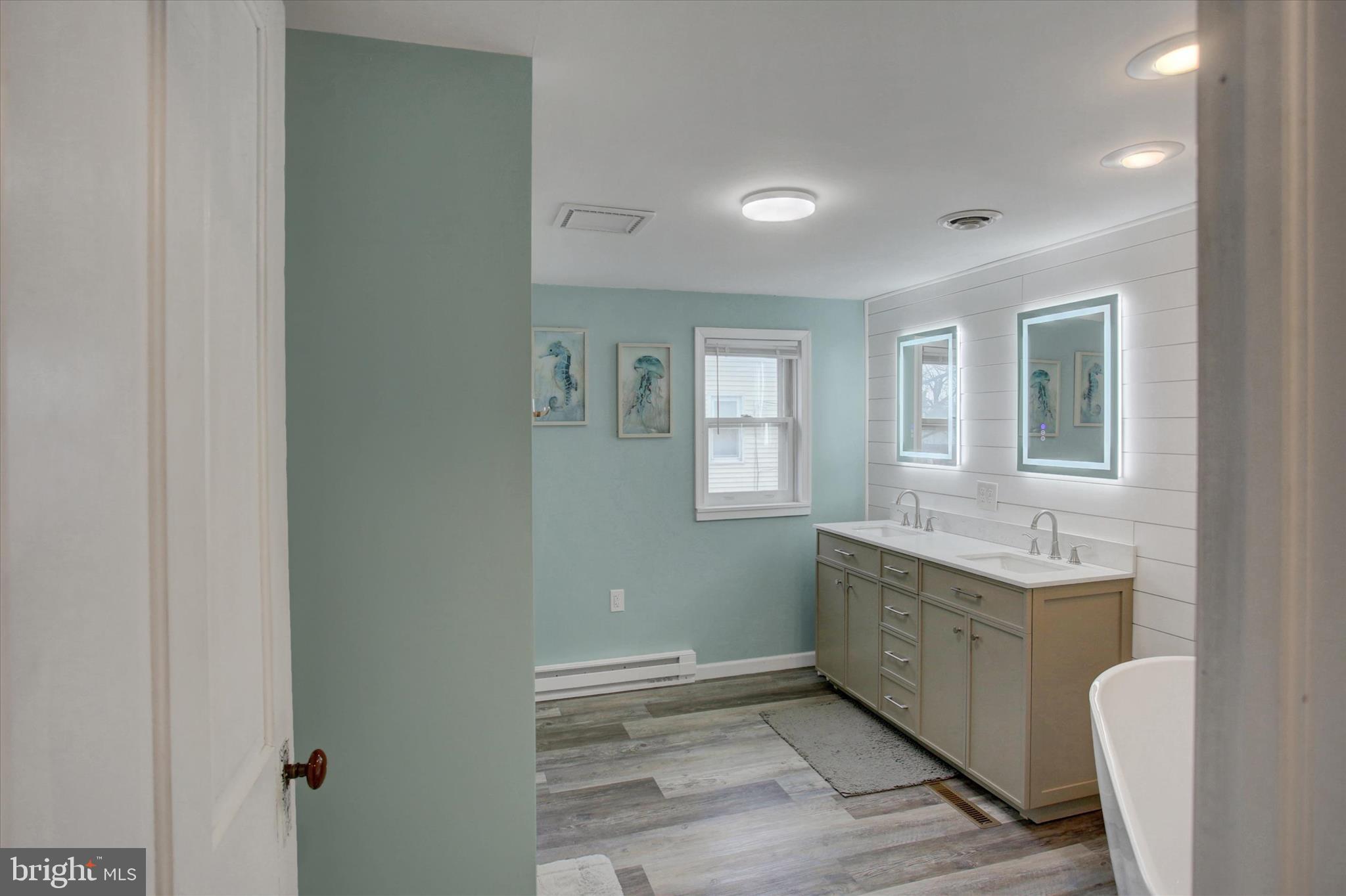 615 Walnut Bottom Road Shippensburg, PA 17257 - Photo 33 of 47 a room with a sink and a mirror