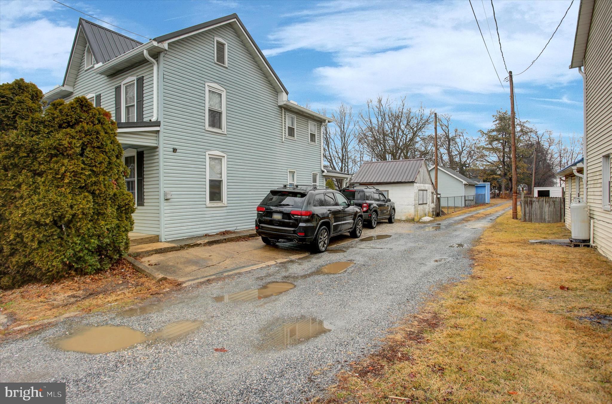 615 Walnut Bottom Road Shippensburg, PA 17257 - Photo 4 of 47 a car parked in front of house