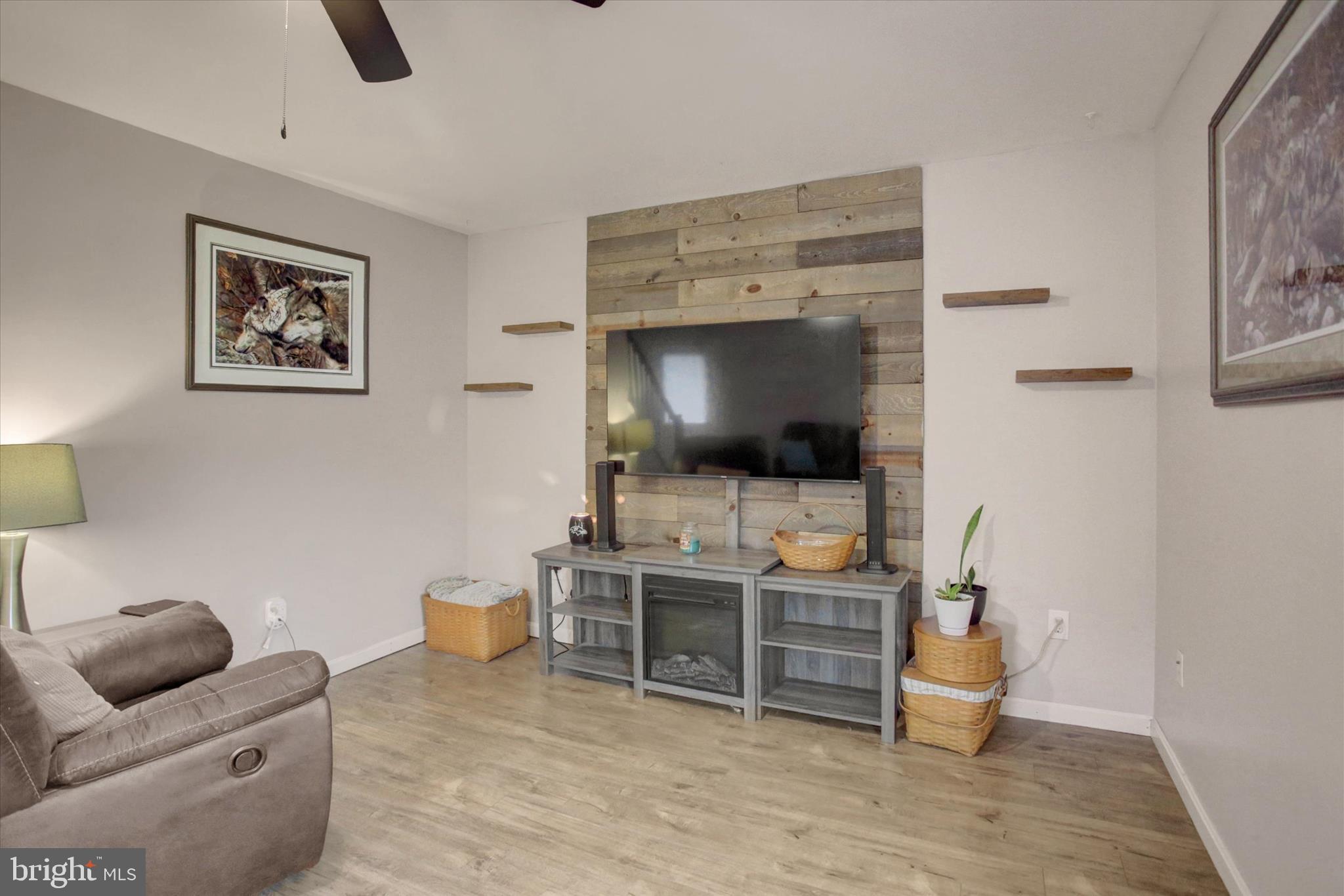 615 Walnut Bottom Road Shippensburg, PA 17257 - Photo 7 of 47 a room with furniture and a flat screen tv