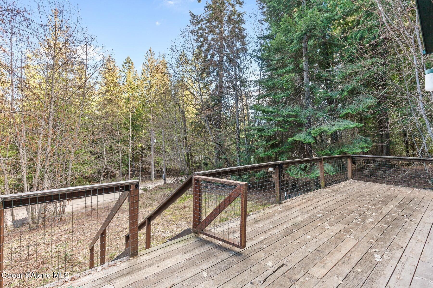 6284 Talache Road Sagle, ID 83860 - Photo 10 of 17 Deck with Wooded Views