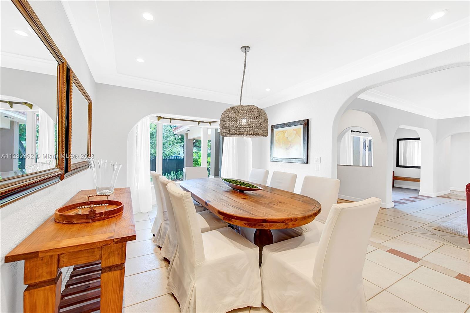100 Southwest 26th Road Miami, FL 33129 - Photo 12 of 34 a dining room with furniture and window