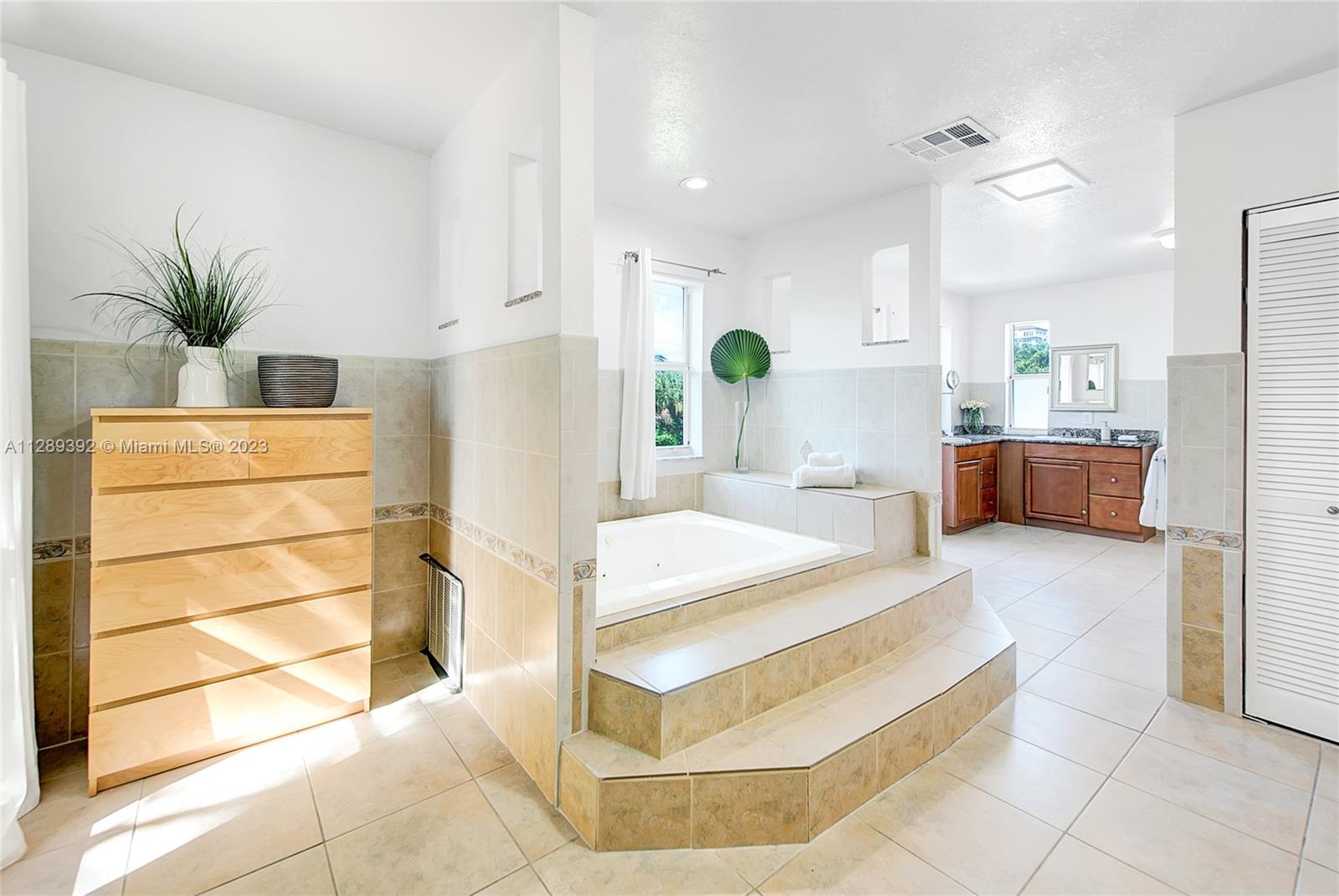 100 Southwest 26th Road Miami, FL 33129 - Photo 26 of 34 a living room with stainless steel appliances kitchen island granite countertop furniture and a view of living room