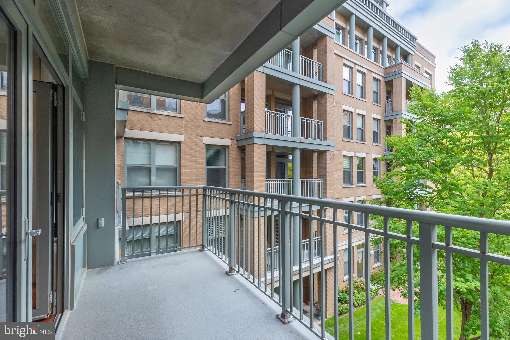 2425 L Street Northwest, Unit 431 Washington, DC 20037 - Photo 23 of 30 a view of a large building from a balcony