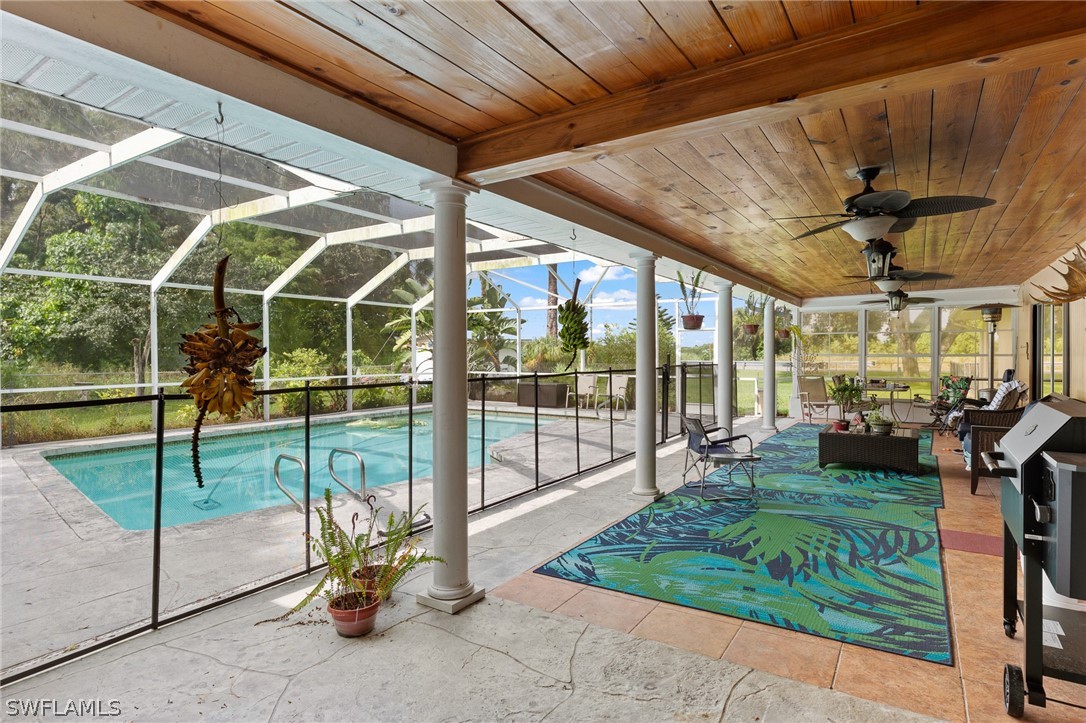2340 Old N River Road LaBelle, FL 33935 - Photo 17 of 28 a view of a porch with chairs