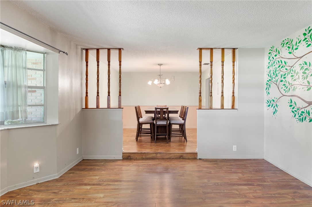 2340 Old N River Road LaBelle, FL 33935 - Photo 5 of 28 a view of a room with furniture and wooden floor