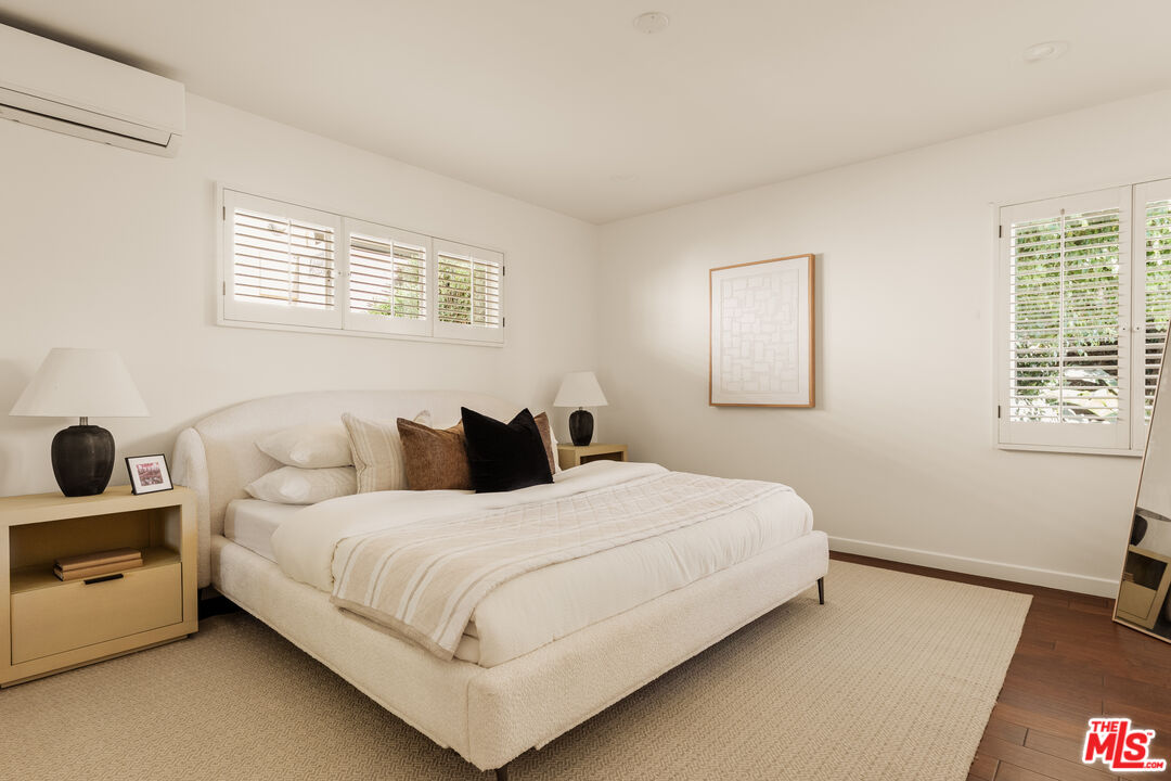 5124 South Corning Avenue Los Angeles, CA 90056 - Photo 15 of 30 a bedroom with a bed and a window