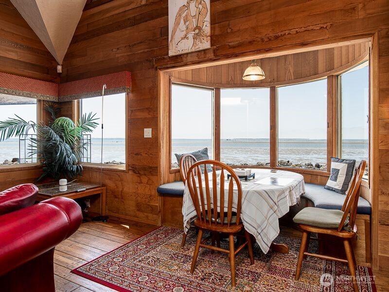 633 Highway 101 Chinook, WA 98614 - Photo 12 of 39 a living room with furniture and a large window