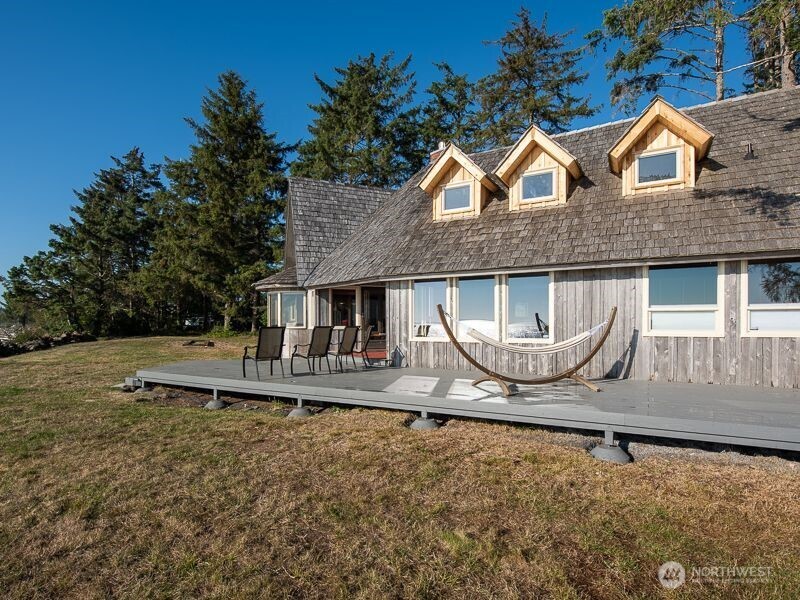 633 Highway 101 Chinook, WA 98614 - Photo 27 of 39 a front view of a house with swimming pool