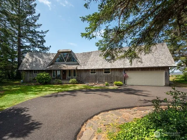 a view of a park with large trees