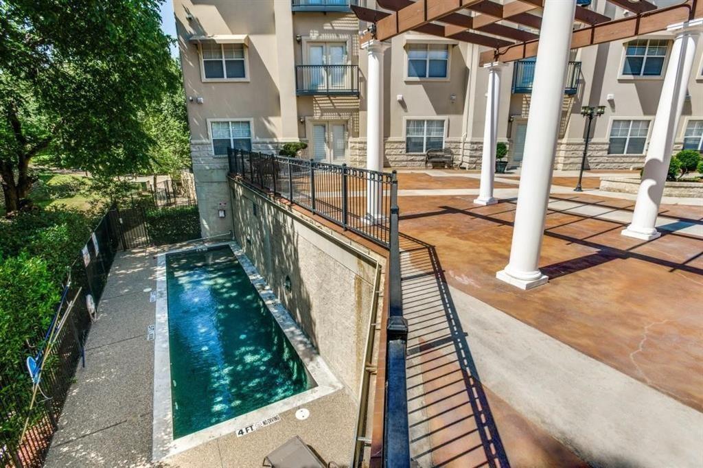 3102 Kings Road, Unit 1207 Dallas, TX 75219 - Photo 4 of 13 View of swimming pool featuring a patio area and a pergola
