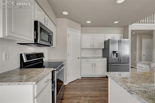 9148 Rockingham Drive Peyton, CO 80831 - Photo 14 of 46 Gallery Image 14