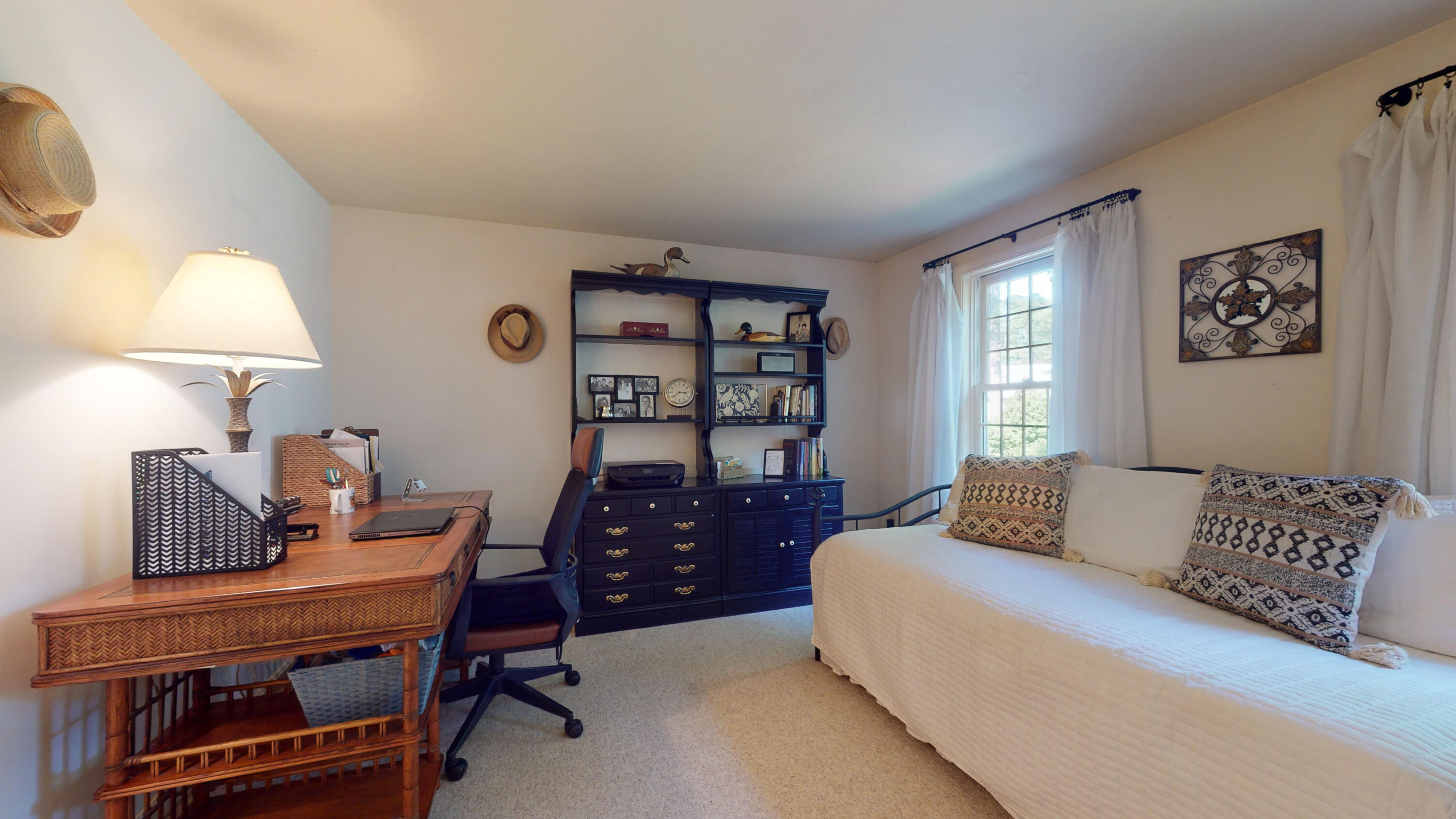 9 Rainbow Drive Centerville, MA 02632 - Photo 16 of 49 a bedroom with a bed and a window