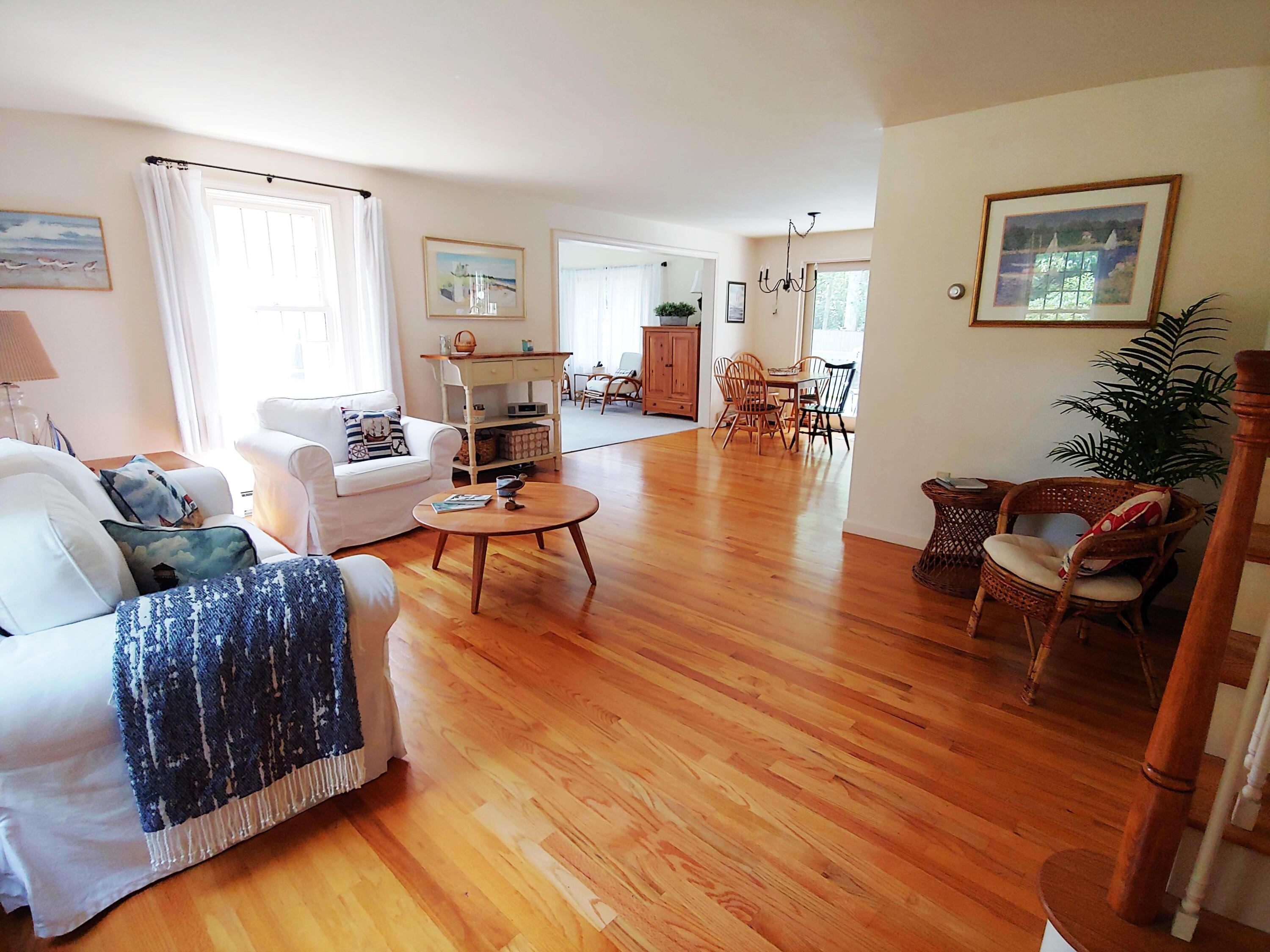 9 Rainbow Drive Centerville, MA 02632 - Photo 3 of 49 a living room with furniture and a wooden floor