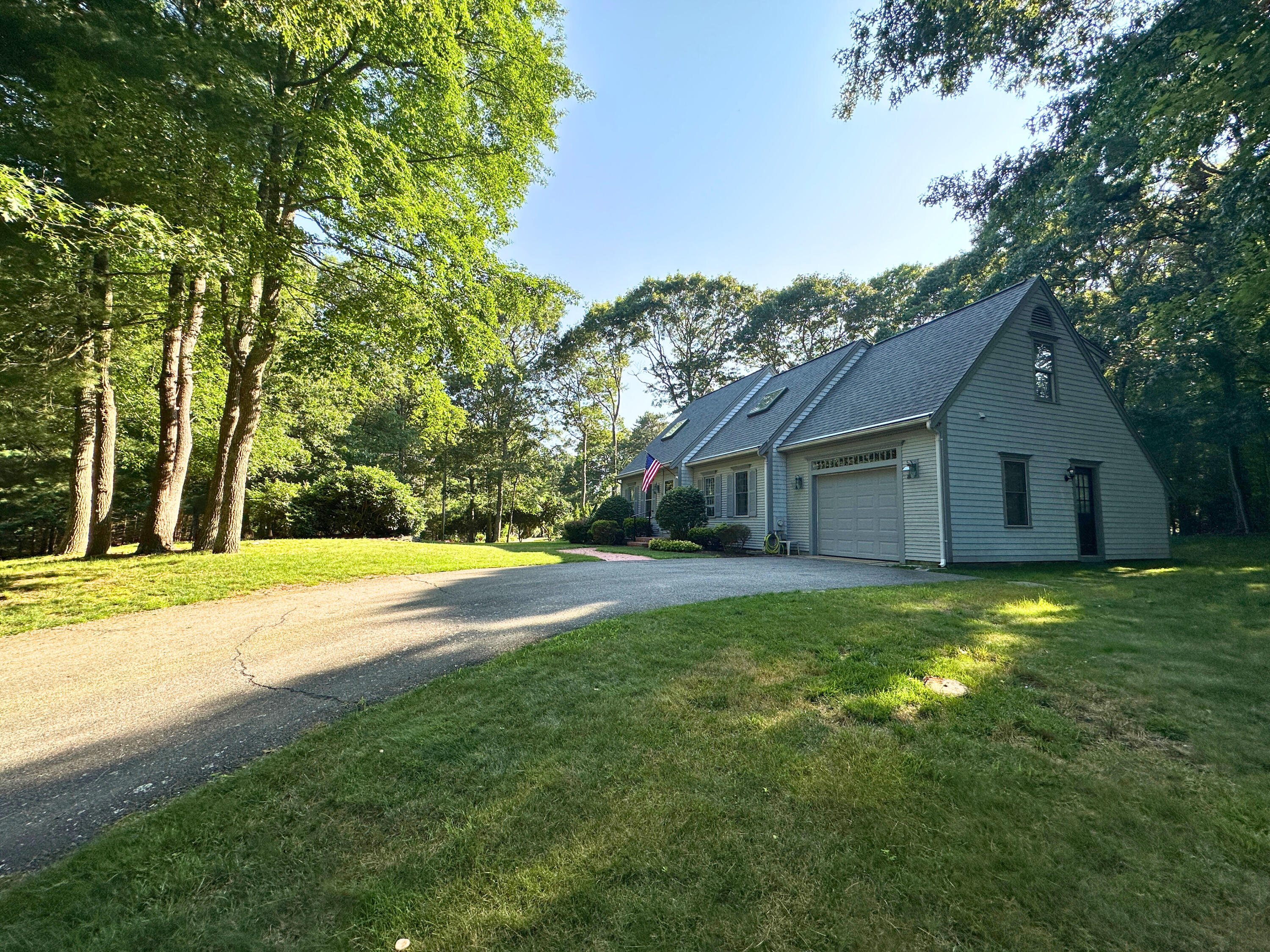 9 Rainbow Drive Centerville, MA 02632 - Photo 31 of 49 a front view of house with yard and trees