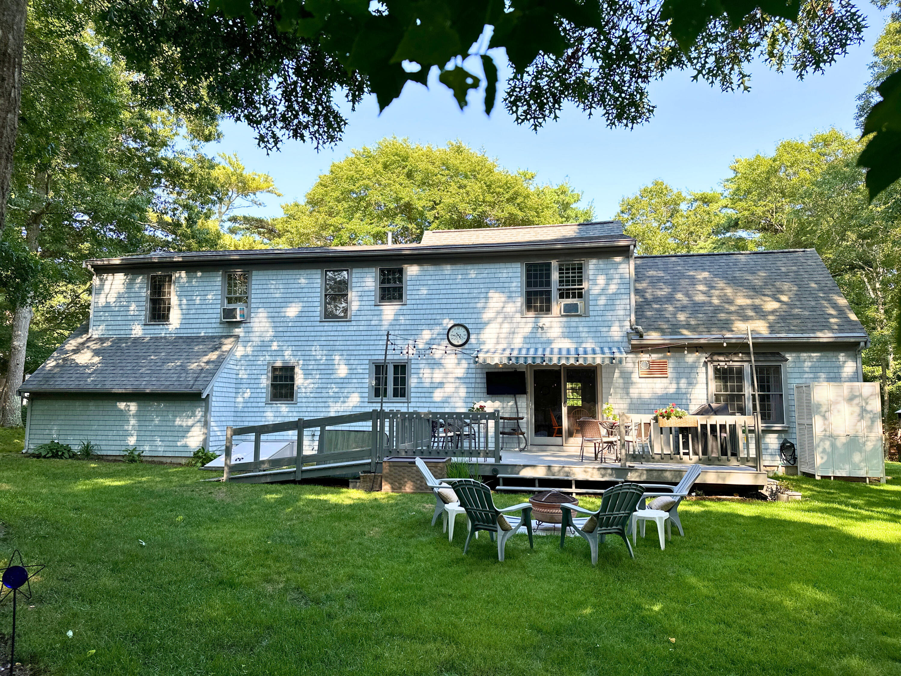 9 Rainbow Drive Centerville, MA 02632 - Photo 35 of 49 a view of a house with a yard porch and sitting area