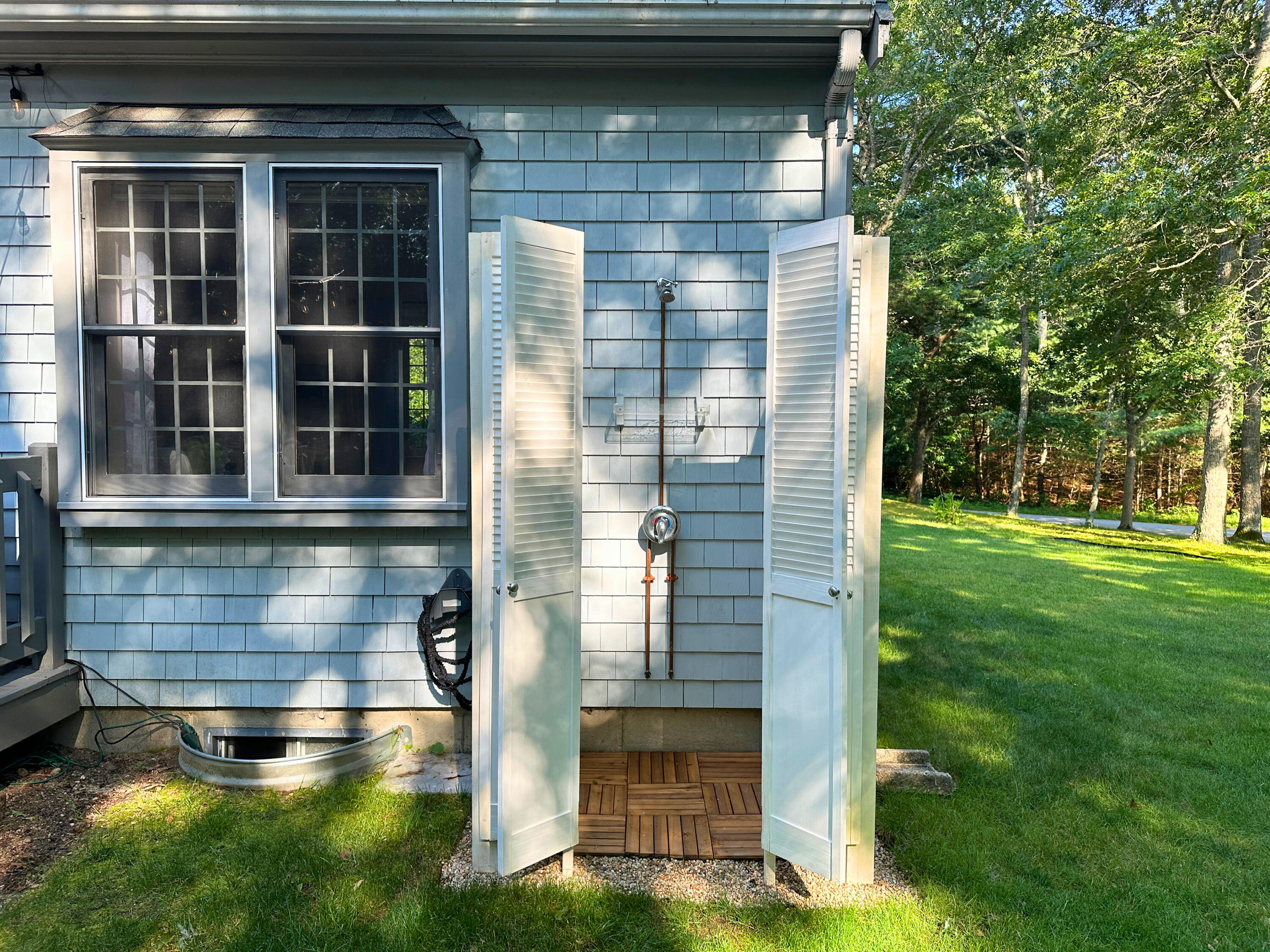 9 Rainbow Drive Centerville, MA 02632 - Photo 42 of 49 a view of brick house with a yard