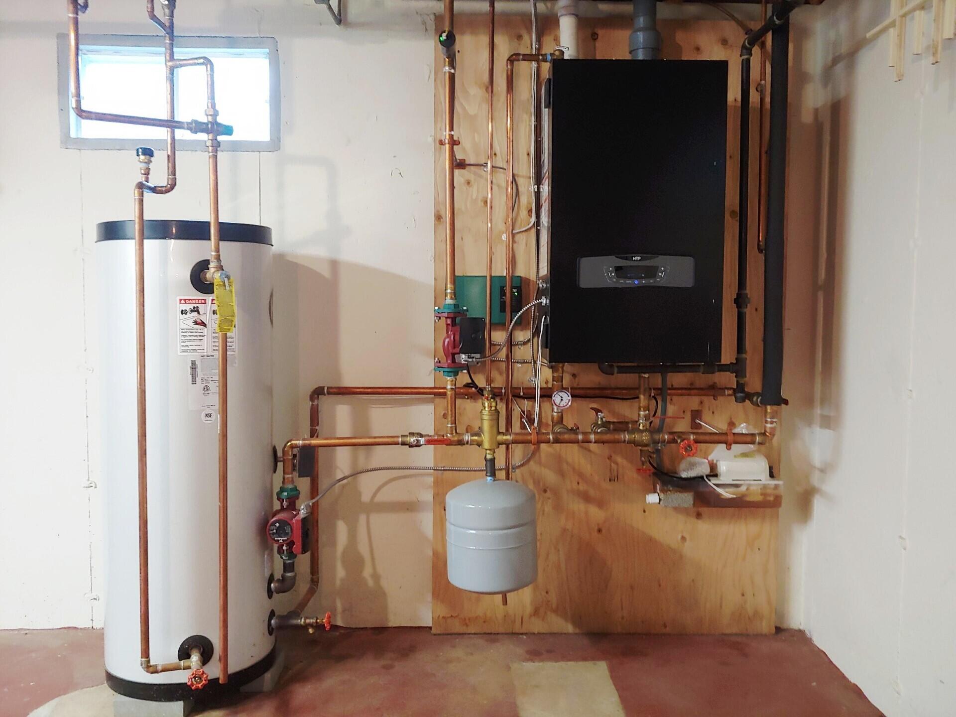 9 Rainbow Drive Centerville, MA 02632 - Photo 44 of 49 a bathroom with a double vanity sink and a mirror