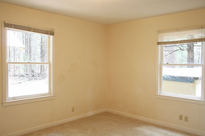 9455 Thatcher Mill Road Shingletown, CA 96088 - Photo 13 of 22 an empty room with a window