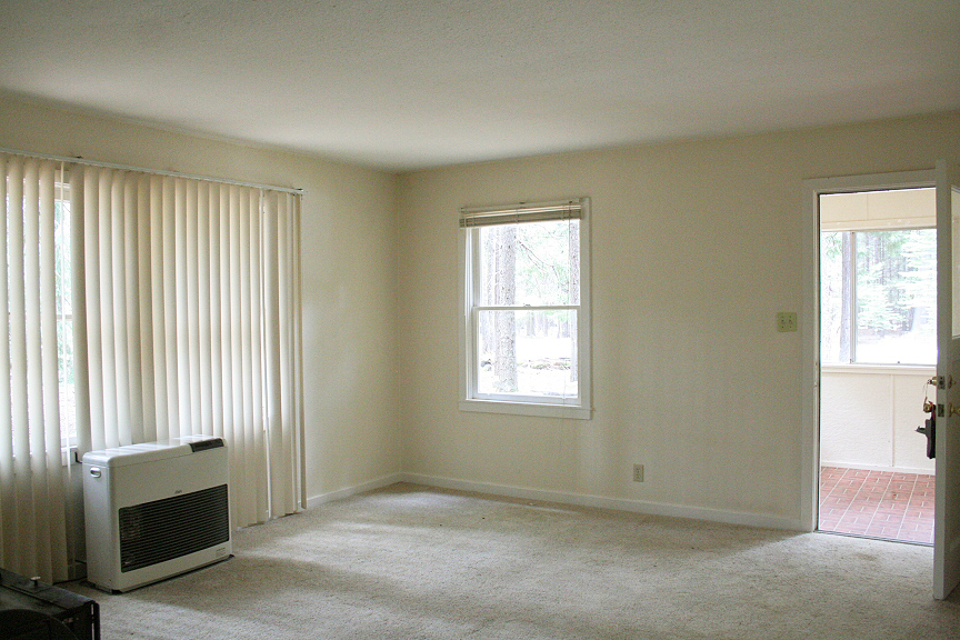 9455 Thatcher Mill Road Shingletown, CA 96088 - Photo 5 of 22 an empty room with windows