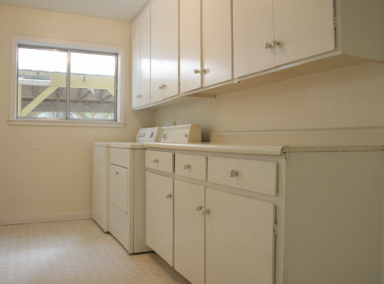 9455 Thatcher Mill Road Shingletown, CA 96088 - Photo 9 of 22 a view of cabinets with window